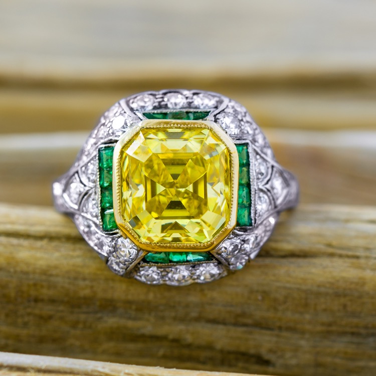 Art Deco Platinum Fancy Vivid Yellow Diamond and Emerald Ring