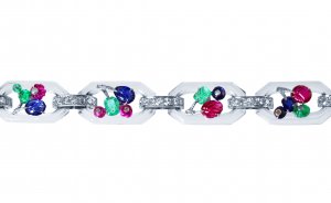 Art Deco platinum, 18 karat white gold, rock crystal, diamond, and carved colored stone 'Tutti Frutti' bracelet by Cartier